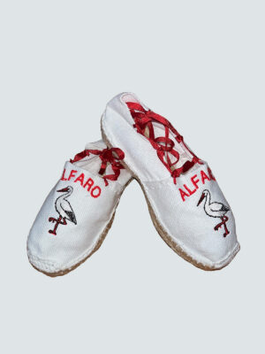 Alpargata artesanal blanca con bordado cigueña